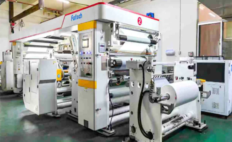 Printed frontal tape production line for disposable diapers